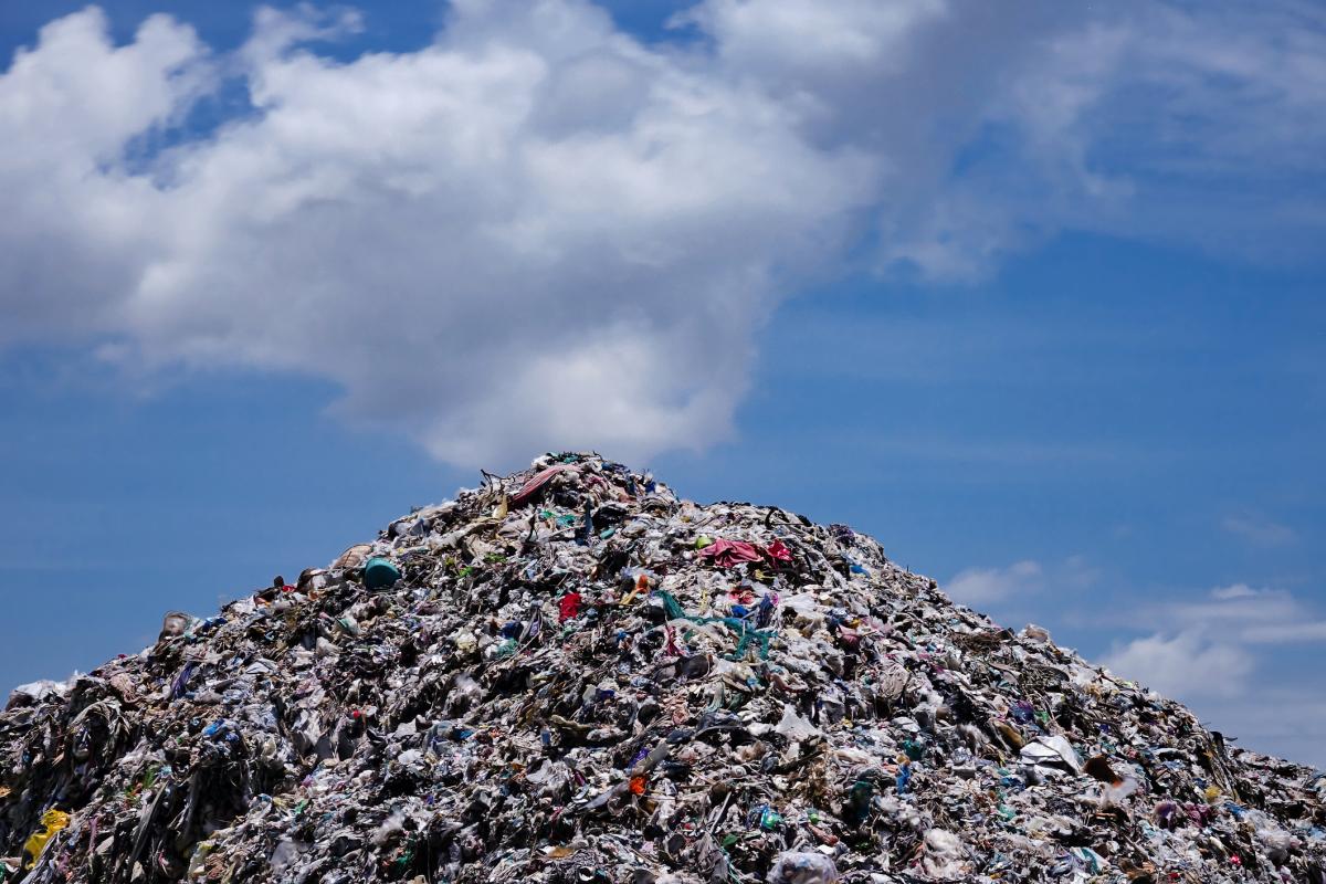 A mound of garbage at a landfill site.