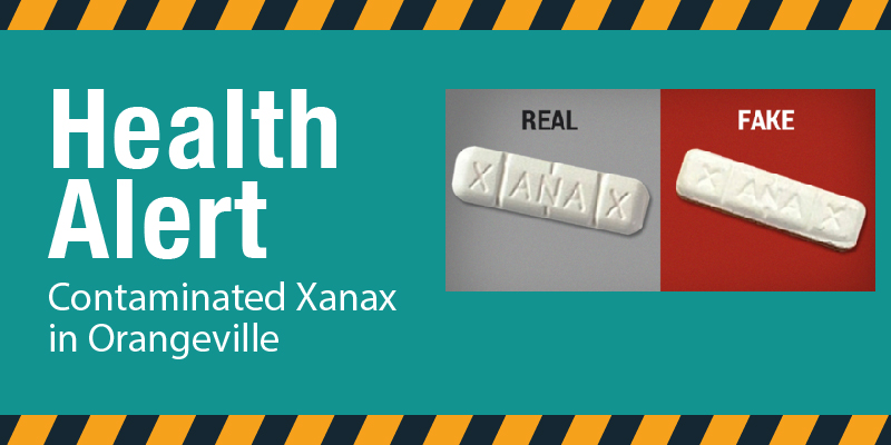 Alert banner showing Real Xanax next to a Fake Xanax