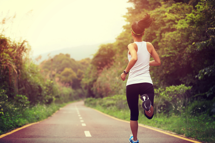 Female running on country road
