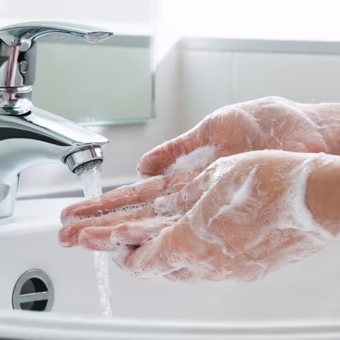 Handwashing in sink