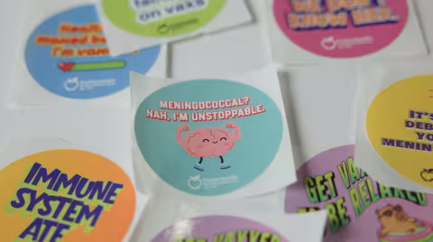 Table of promotional vaccine stickers
