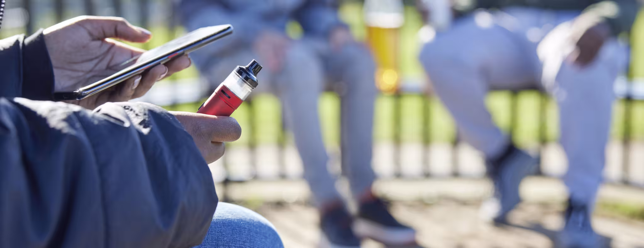 teens vaping in park 