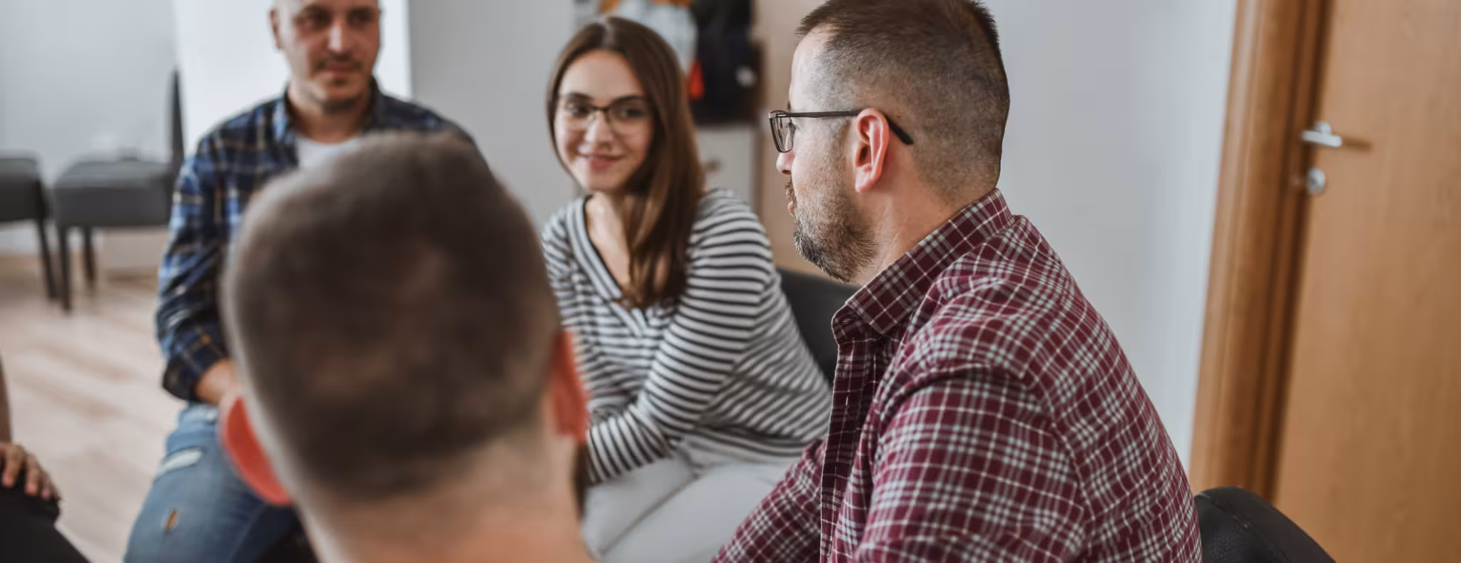 Female and Men Carefully Listening to Male Talking and Sharing His Story in Support Group