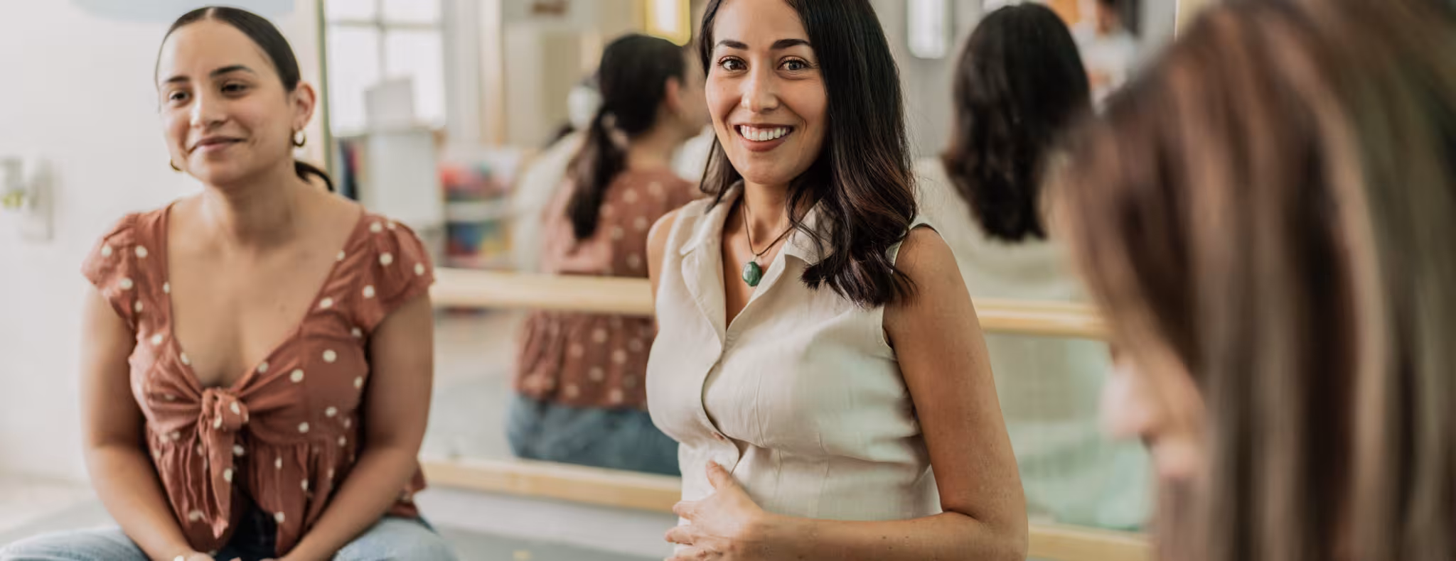 Portrait of a mid adult pregnant in a support group