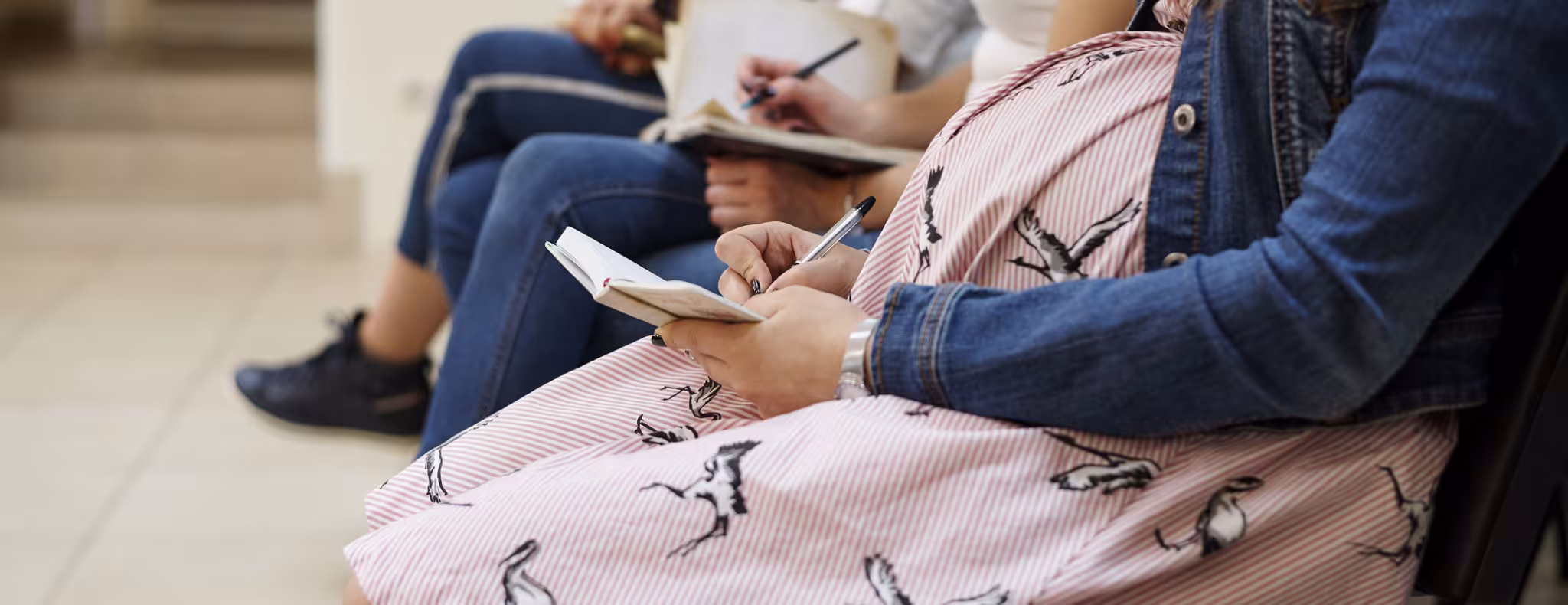 Expectant mothers in an education setting.